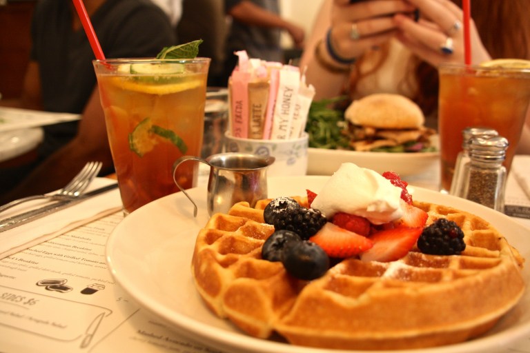 rosewater waffle with berries, yogurt, and honey